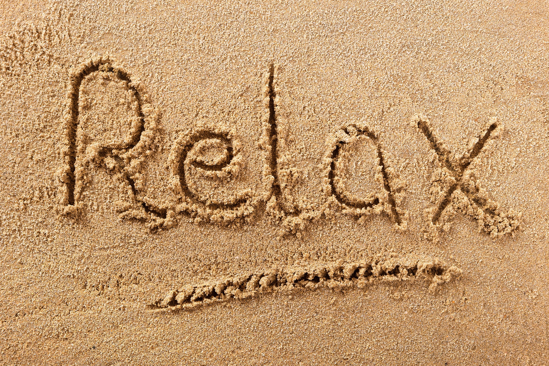 Wort Relax in Sand geschrieben | Elf Bar Elfa